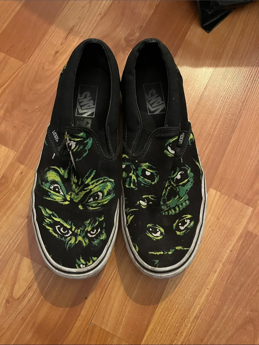 Vans Black Slip-On Sneakers with Eyes in the Dark Size M 10.5 W 12